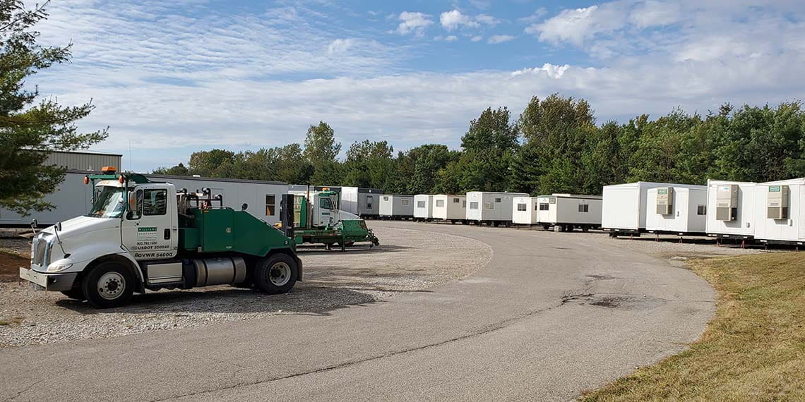 a row of mobile offices and portable offices in a yard of WillScot Cincinnati, OH