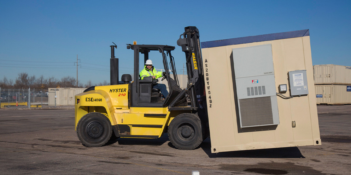 A Ground Level Office Unit being moved by a fork lift