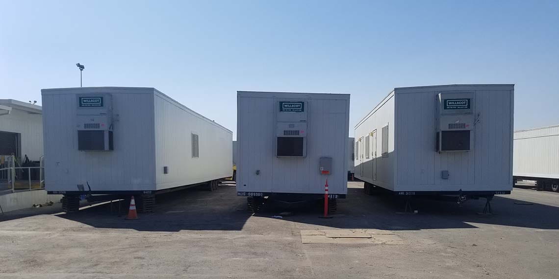 three mobile offices lined up at the WillScot Los Angeles, CA yard